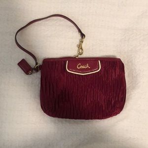 maroon coach wristlet